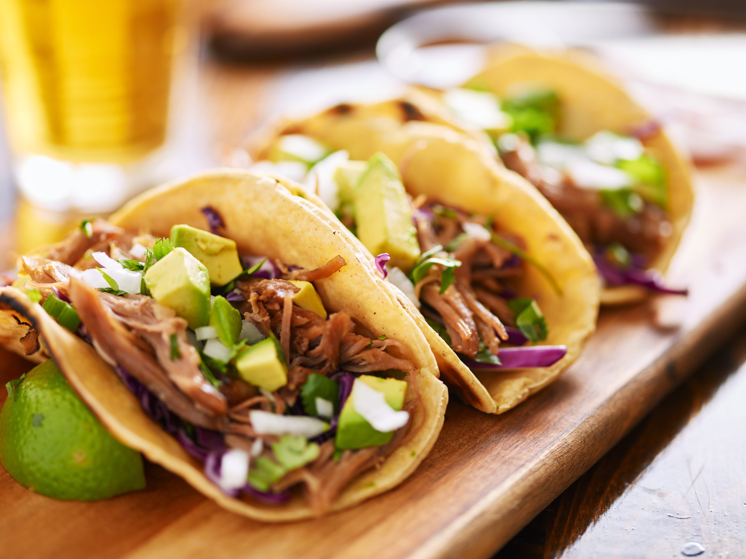 Three,Pork,Carnitas,Street,Tacos,In,Yellow,Corn,Tortilla,With