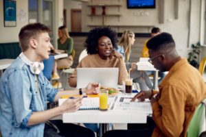 students sitting around a table studying