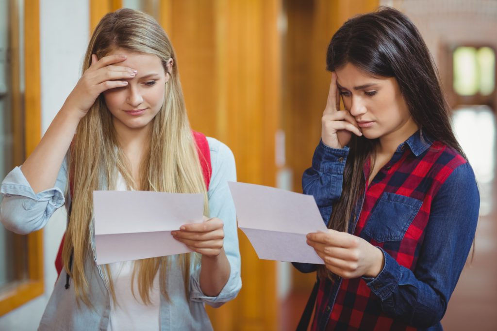 Anxious,Students,Looking,At,Results,At,University