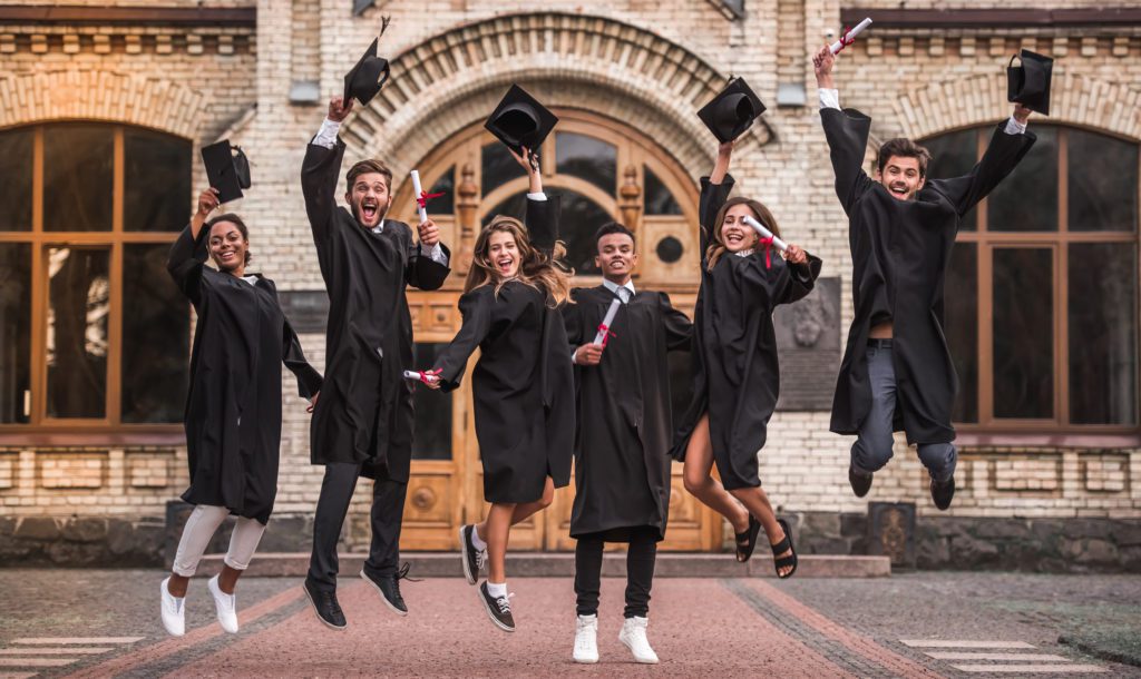 Graduates jumping for joy