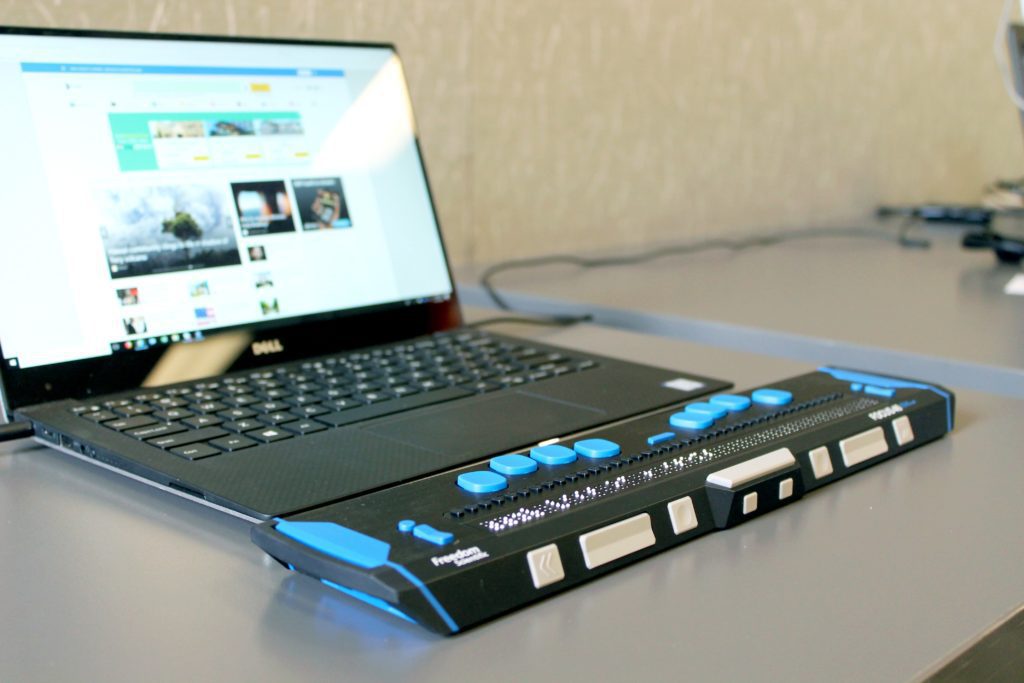 A laptop with an assistive keyboard