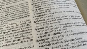 a photo of a page in a dictionary defining dyslexia