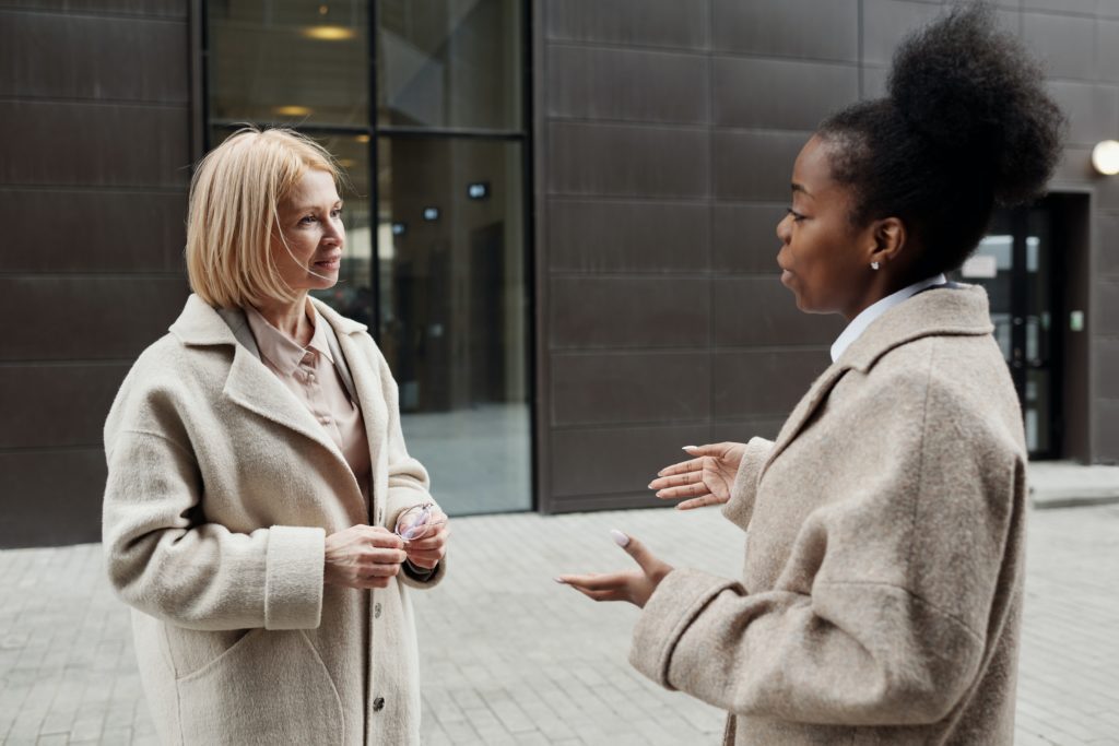 two females talking outside about anxiety