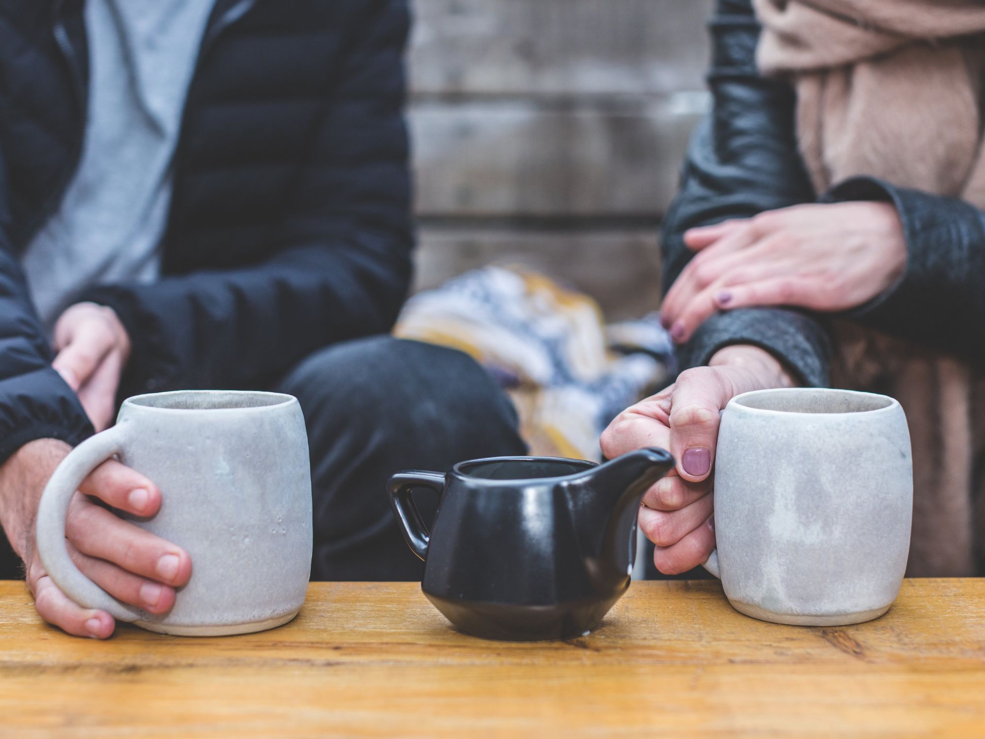 two friends having a cup of coffee