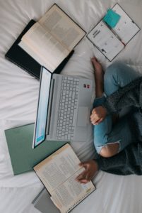 student with laptop university uk