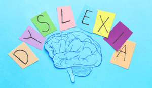 dyslexia written on different coloured squares with an illustration of a brain