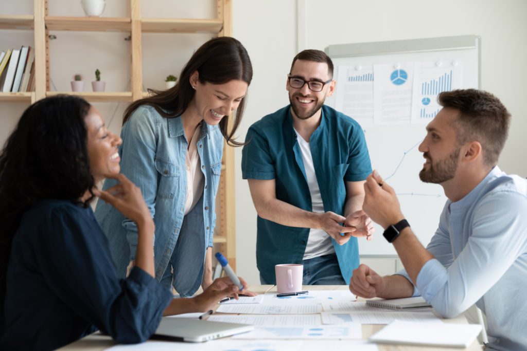 a group of people working together at university doing group work